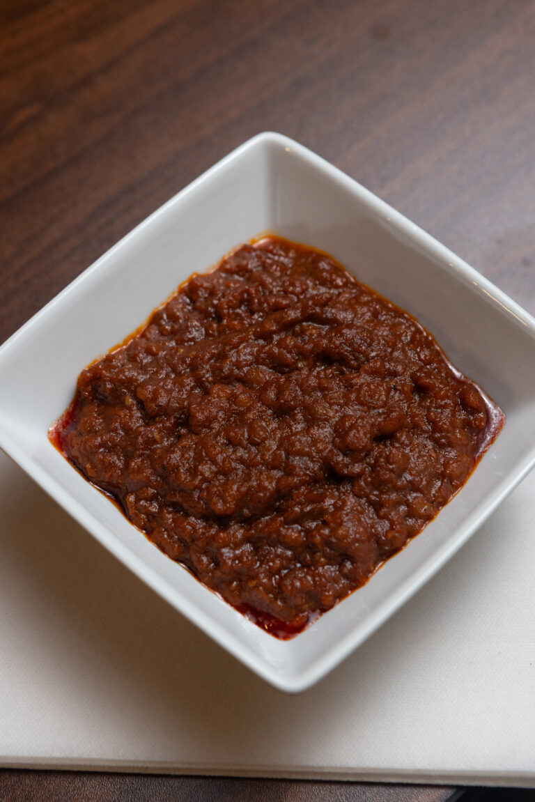 Misir Wat - Red lentil stew braised in a garlic, ginger and onion broth with berbere.